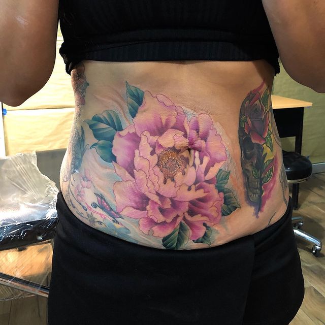 cover up lower stomach tattoos for girls