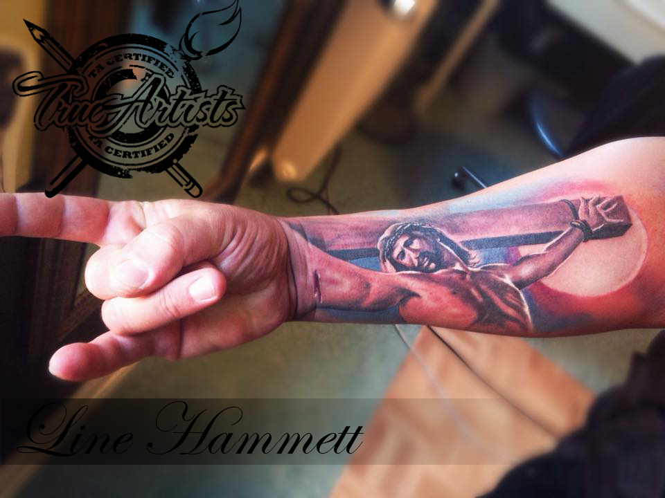 jesus forearm tattoo