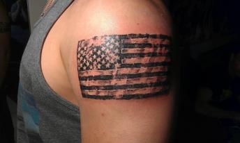 black and white american flag tattoo