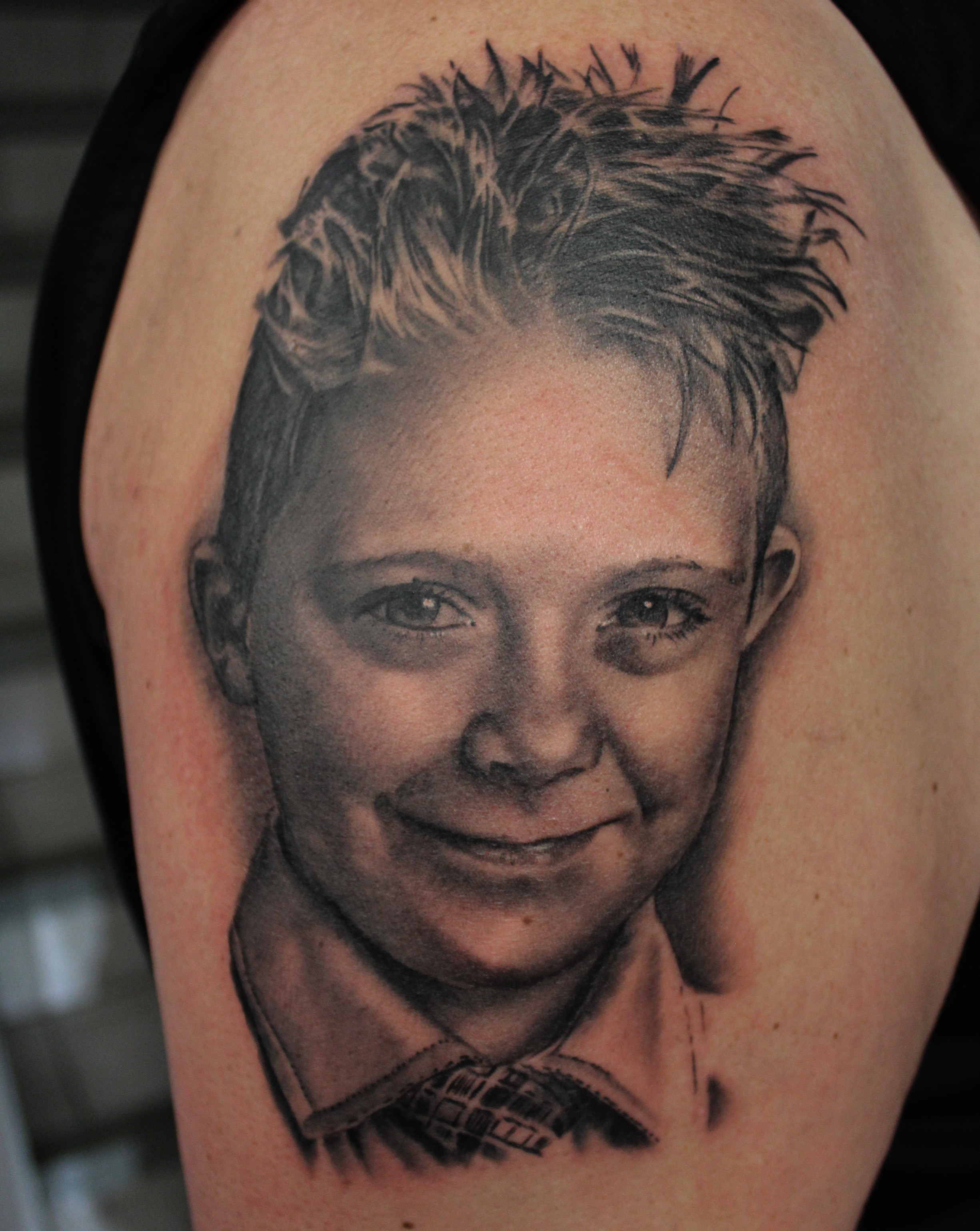 portrait tattoos on arm